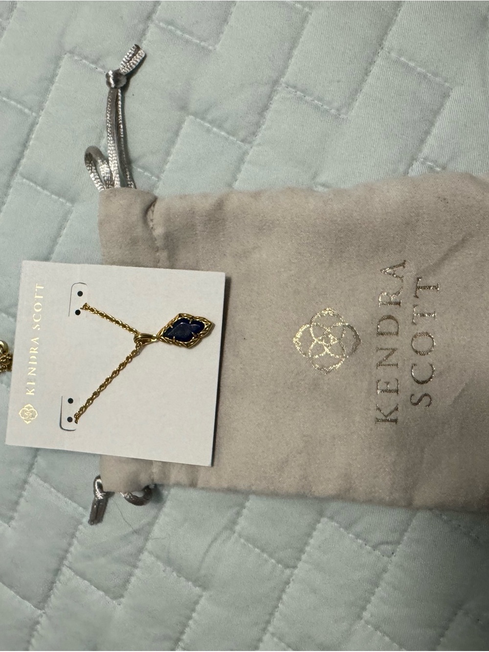 Kendra Scott Gold Necklace with Dark Blue Pendant
